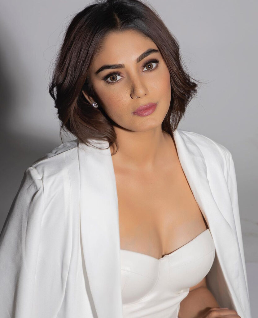 stunning film and tv actress Sana Makbul in a white dress